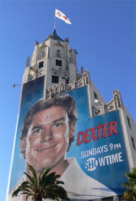 Huge poster of TV show covers entire side of building 