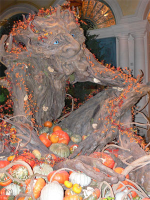 Thanksgiving display of a harvest gargoil in the form of a human tree. 